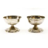 A pair of George III hammered silver circular salts, London, 1804, 3.9ozt