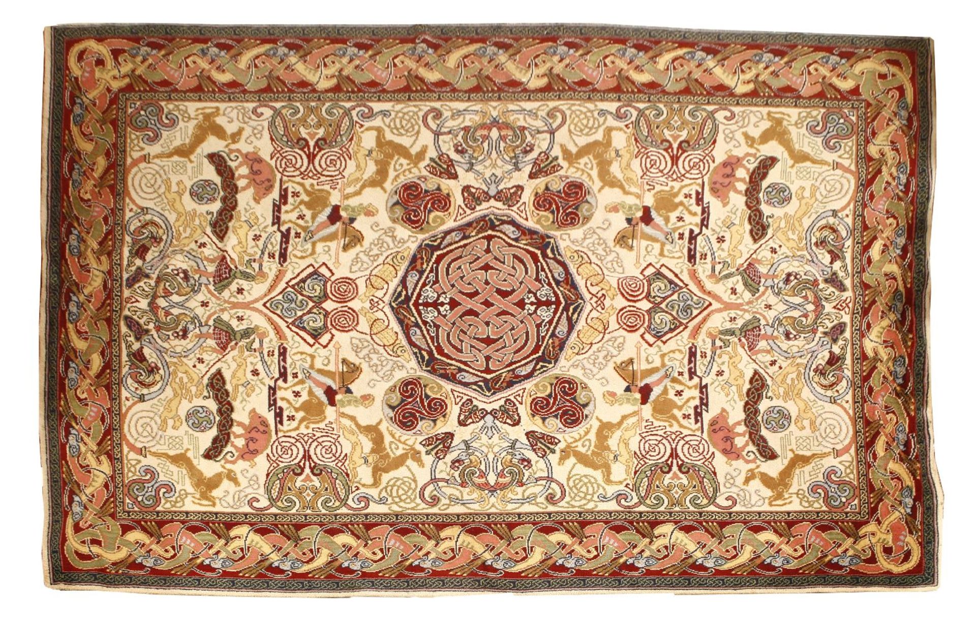 A Celtic 'hunting' wool carpet,designed by George Bain (1881-1968) for Quayle and Tranter Ltd.,