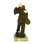 An Art Deco patinated bronze figure,a Pierrot holding a mandolin, on an onyx plinth, signed 'C