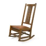 An oak rocking chair, designed by Gustav Stickley, manufactured by the Craftsman Workshops,c.1905-