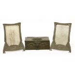 A pair of Art Nouveau pewter photograph frames,each with easel backs,15cm wide19.5cm high, anda
