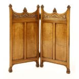 A satinwood two-leaf screen,in the manner of Arthur Heygate Mackmurdo (1851-1942), possibly