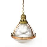A Holophane moulded glass hanging light,with brass and copper mounts, the glass moulded with 'patent