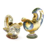 Two Cantagalli maiolica pottery dolphin ewers,the first in the Gubbio lustre style, restored plinth,