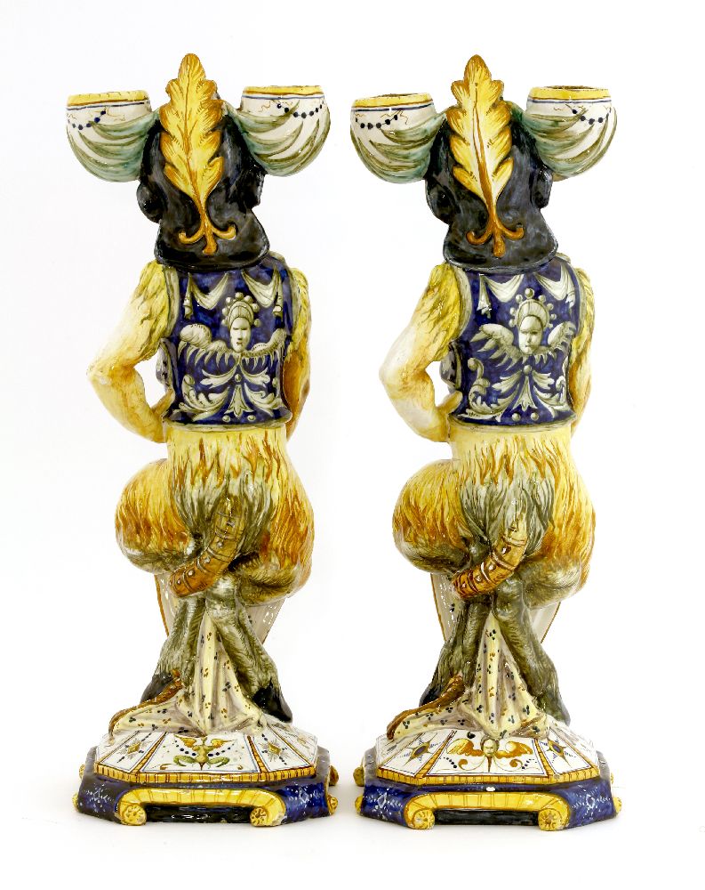 Two Cantagalli maiolica pottery candlesticks,each modelled as a faun wearing a helmet, holding a - Image 2 of 3