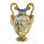 A Cantagalli maiolica pottery twin-handled vase,in the Urbino style, painted with figures presenting