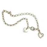 A Links of London sterling silver oval link chain necklace, with two heart shaped charms, marked