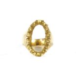 A gold ring mount, (tested as approximately 18ct gold)9.51g