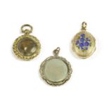 A gold locket, with blue enamel Forget-me-knot flower decoration, and two gold cased glazed