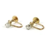 A pair of single stone cushion cut and old Swiss cut diamond screw back earrings, marked 9ct1.27g