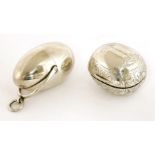 A George III silver nutmeg grater,Thomas Meriton, London 1801,of plain ovoid form and having a swing