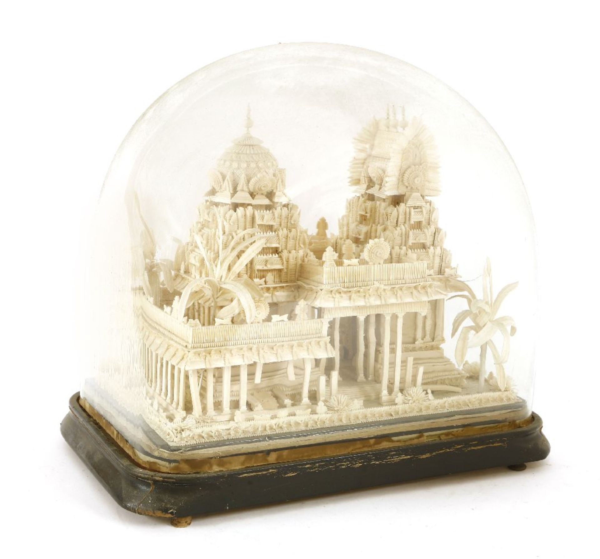 A carved wooden model of a Thai temple ruin, 19th century, raised under a glass dome,50cm wide30cm - Image 2 of 2