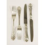 A set of twelve pairs of silver table knives and forks, by Elkington & Co., London 1902, with leaf-