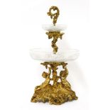 A gilt bronze centrepiece,mid-19th century, with two crisply cut bowls on a fruiting vine centre