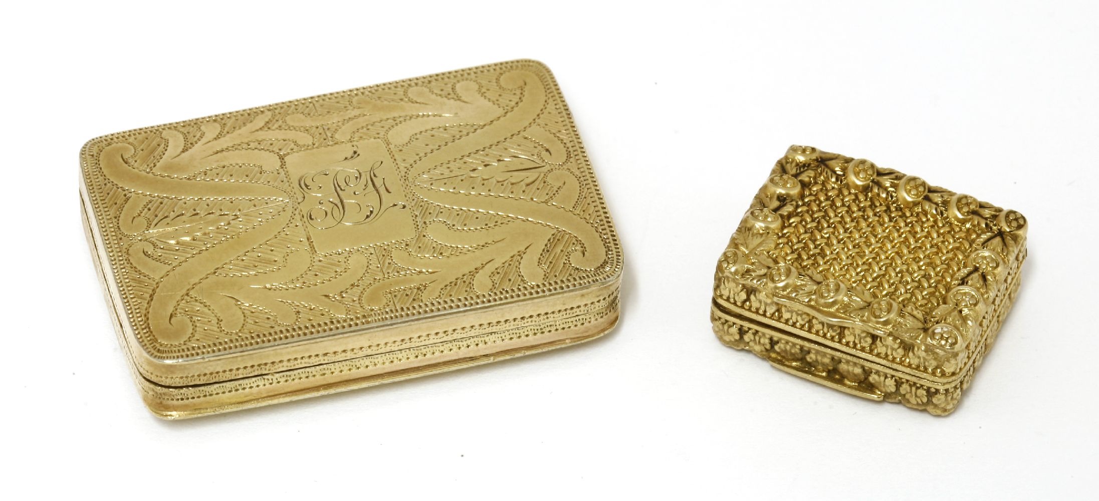 Two silver gilt vinaigrettes,John Wilkinson, Birmingham 1811,with an elegantly engraved cover and