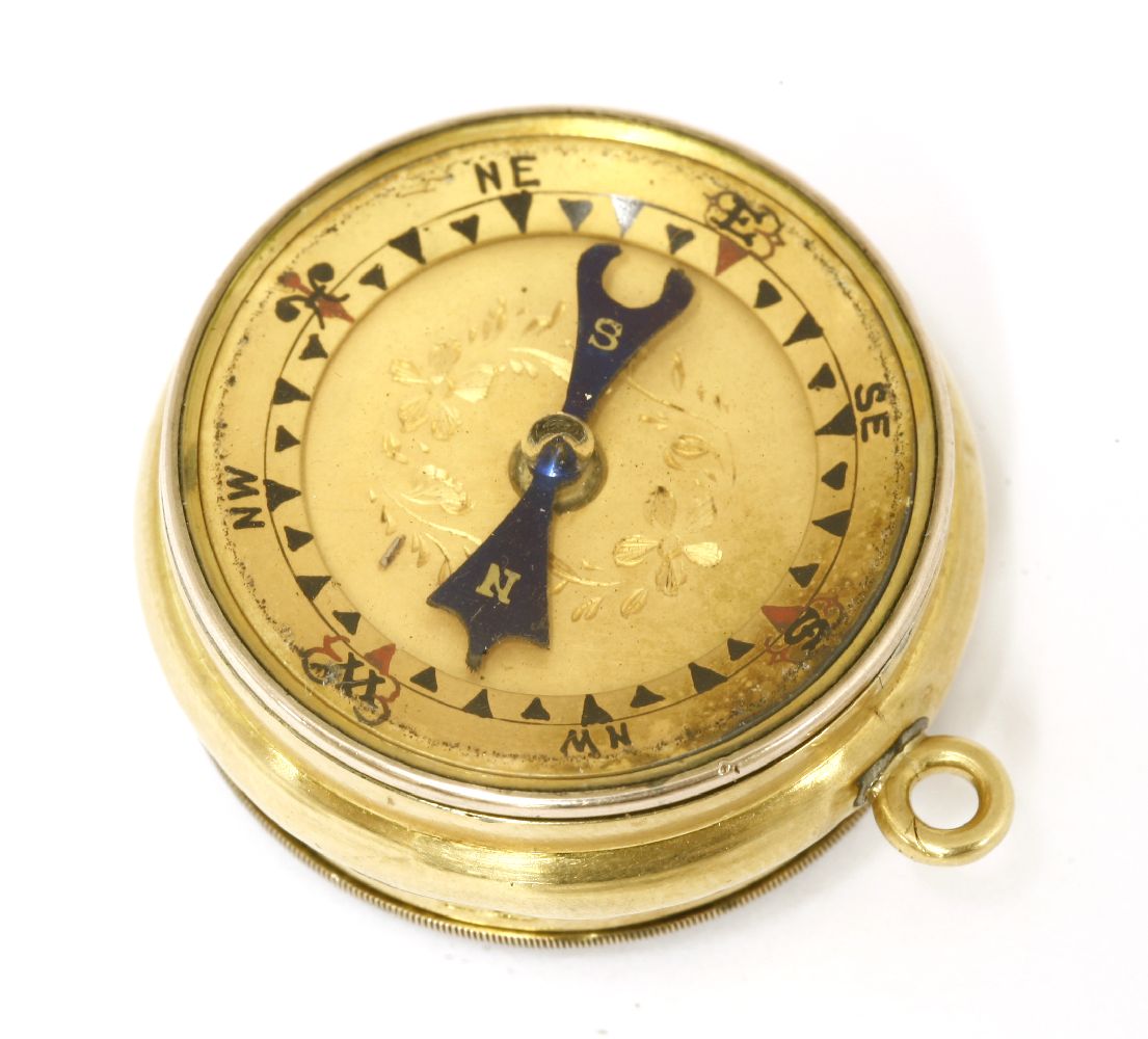 An 18ct gold pocket barometer and compass,stamped 18ct,2.5cm diameterProvenance: The Property of a - Image 2 of 2