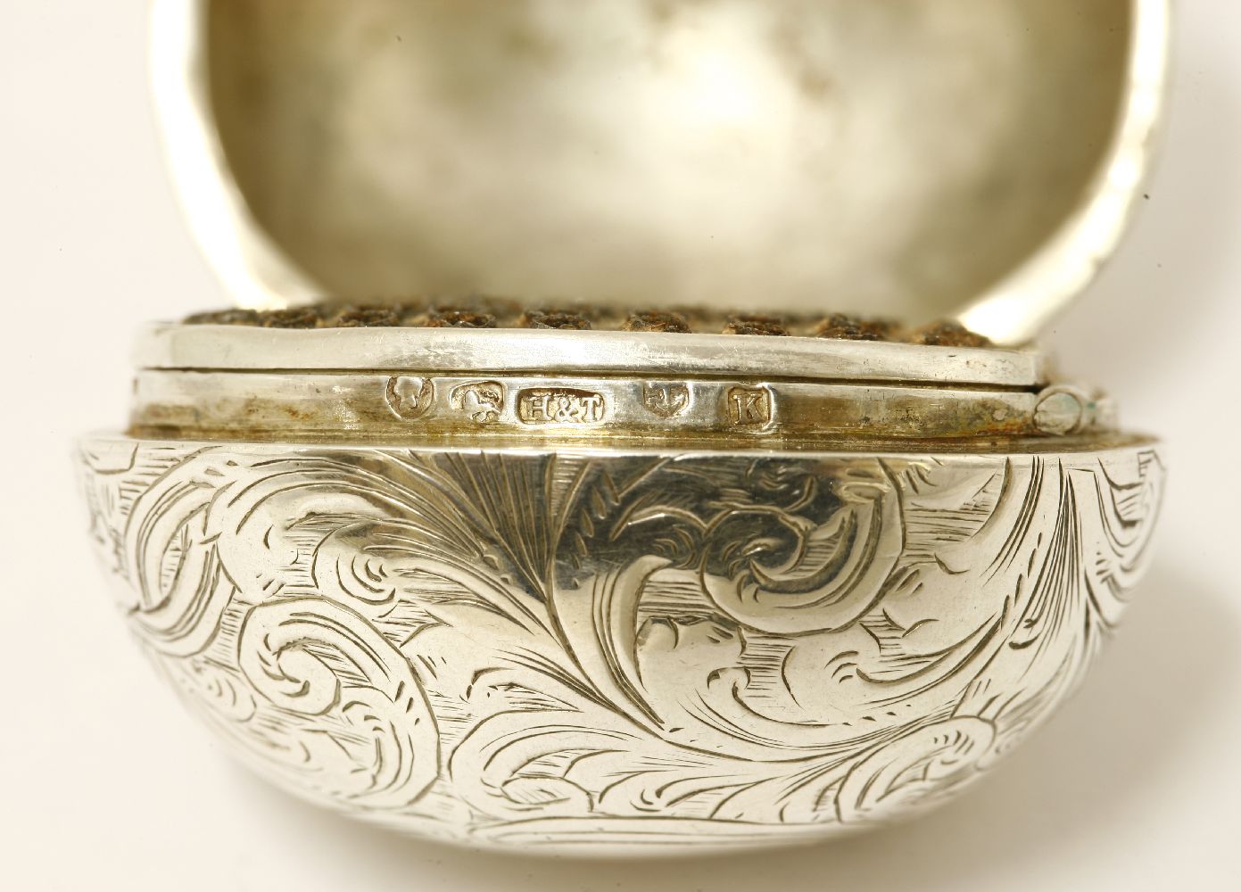 A George III silver nutmeg grater,Thomas Meriton, London 1801,of plain ovoid form and having a swing - Image 3 of 4