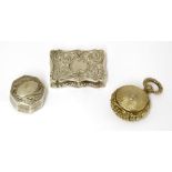 Three silver vinaigrettes,David Pettifer, Birmingham, 1853,of serpentine shape with engraved