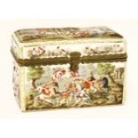 A large Capodimonte porcelain table casket, late 19th century, moulded in relief and decorated in