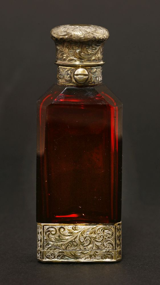 A ruby glass scent bottle and vinaigrette,Sampson Mordan, London 1860,with engraved silver gilt