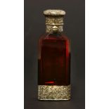 A ruby glass scent bottle and vinaigrette,Sampson Mordan, London 1860,with engraved silver gilt
