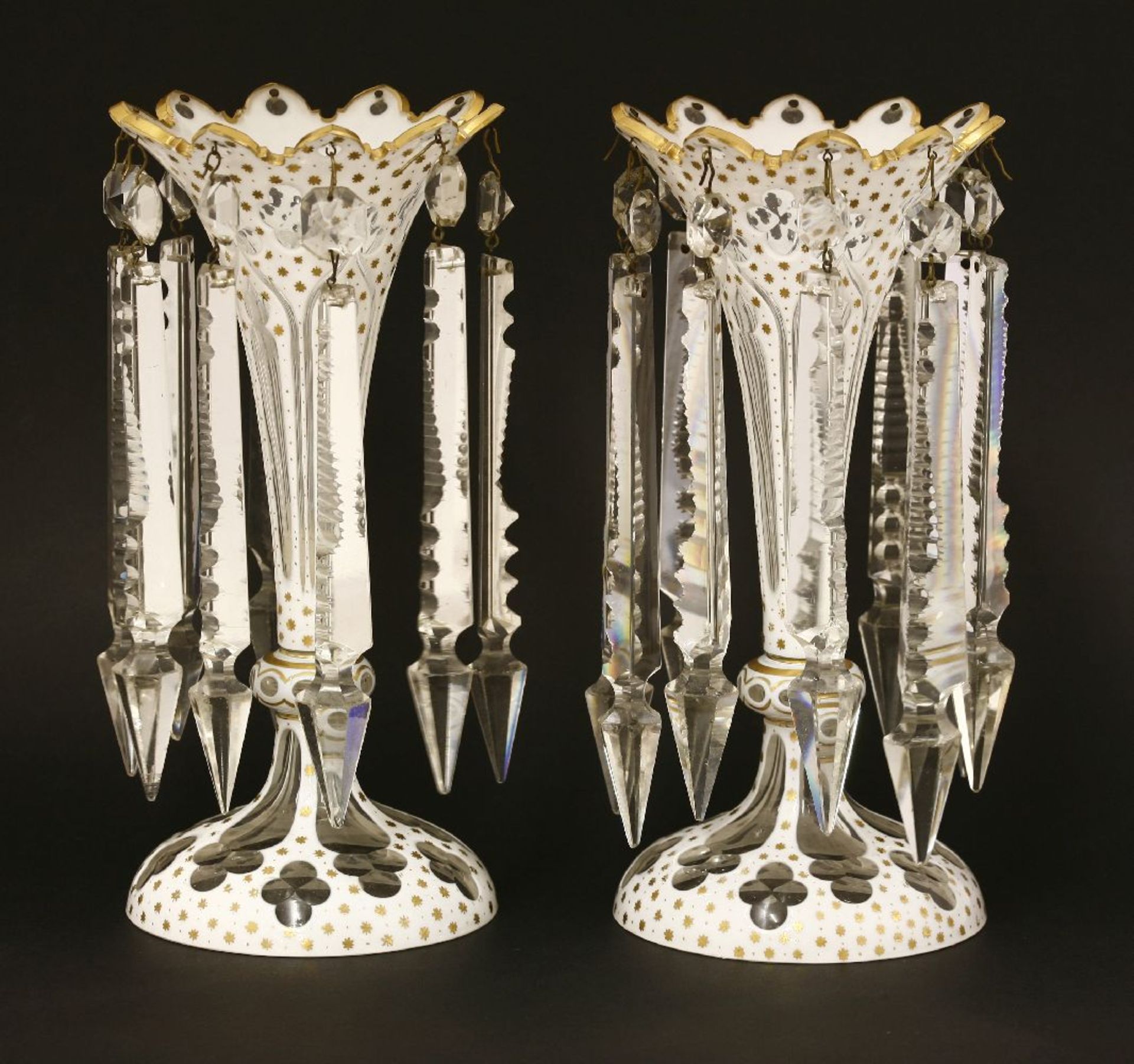 A pair of Bohemian cased glass lustres,with Gothic arched edges and details,26cm high (2)