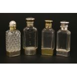Four silver and glass combination scent bottles and vinaigrettes,two Sampson Mordan & Co., London