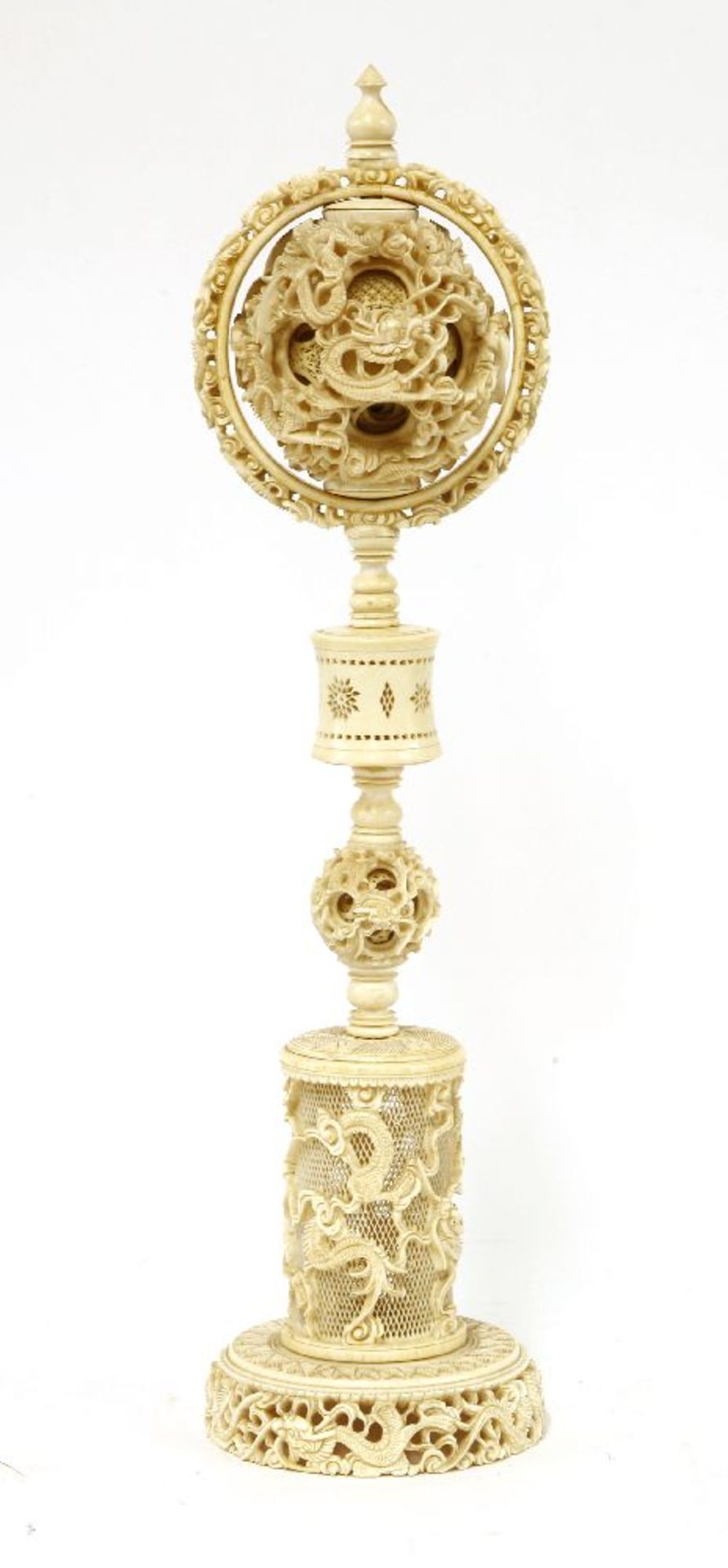 A Chinese ivory ball and stand,late 19th century, the ball exterior carved with dragons amongst - Bild 2 aus 3
