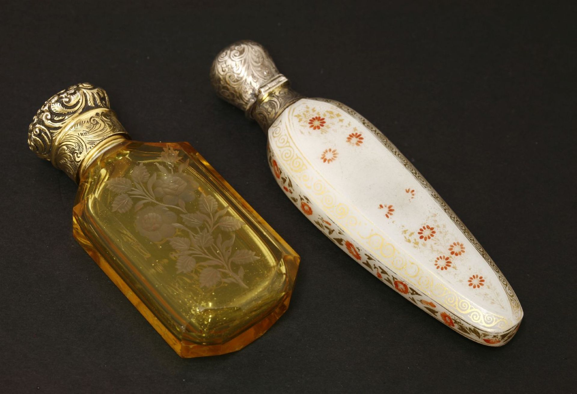 Two scent bottles,one opaline glass of slender teardrop shape painted with an elephant and figures