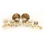 Derby porcelain,18th/19th century, two tea bowls and saucers and a coffee cup, each painted with a
