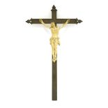 An ivory crucifix,19th century, with Christ on an ebonised cross,36cm highProvenance: The Estate