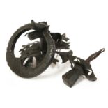 A large wrought iron dragon door knocker, 19th century,the ring 24cm diameter