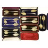 A collection of silver 'berry' spoons,various dates and makers,including:five boxed sets of two