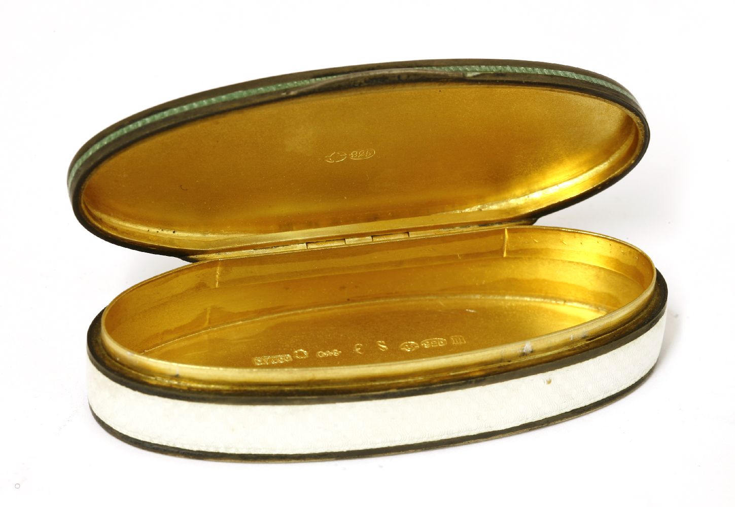 An oval silver gilt and enamel pill box,import marks, London 1887,with engine turned decoration, - Image 2 of 2