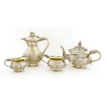 An Indian silver three-piece tea set, the handles formed as elephant's heads and trunks,together