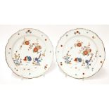 A pair of Worcester Kakiemon plates,c.1760/70, each painted with quail, with brown edging,21.5cm
