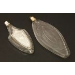 Two George lll glass scent bottles,one with an engraved inset silver box of shield shape below a