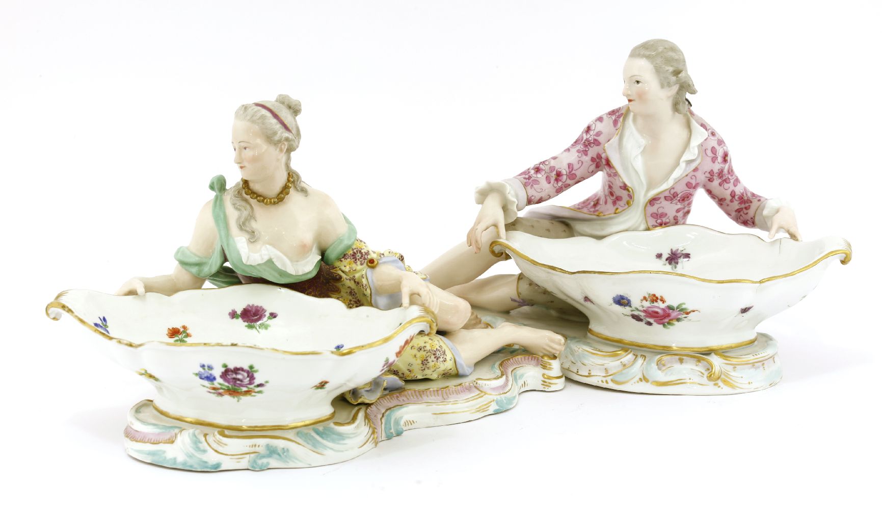 A near pair of Meissen porcelain figural salts,c.1880, modelled as a lady and a gentleman, each