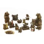 A collection of Black Forest bear items, variously carved with bears, modelled as reel holders,