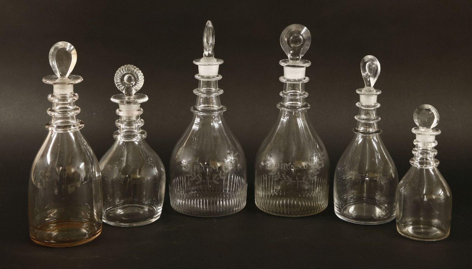 A pair of George III decanters and stoppers,with bullseye stoppers and mallet-shaped bodies engraved
