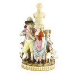 A large Meissen group,of a courting couple, he offering her a ring, a rival hiding behind an herm,