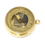 An 18ct gold pocket barometer and compass,stamped 18ct,2.5cm diameterProvenance: The Property of a