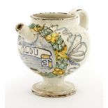 An Italian maiolica wet drug jar,c.1700, labelled 'BOLDUS' on a scroll,16.5cm high, andanother urn