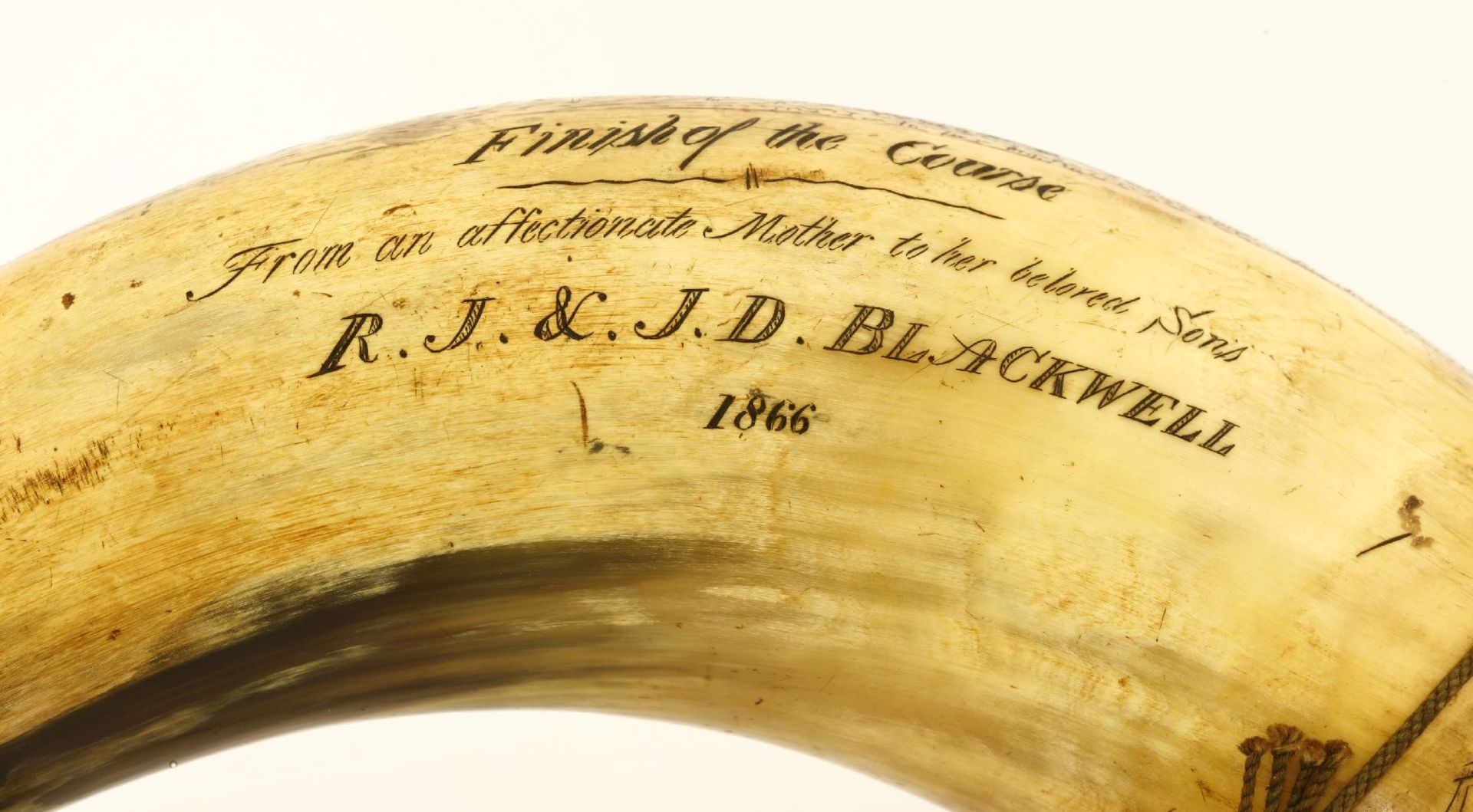 A scrimshaw hunting horn,mid-19th century, depicting hare coursing scenes, and inscribed 'From an - Image 3 of 4