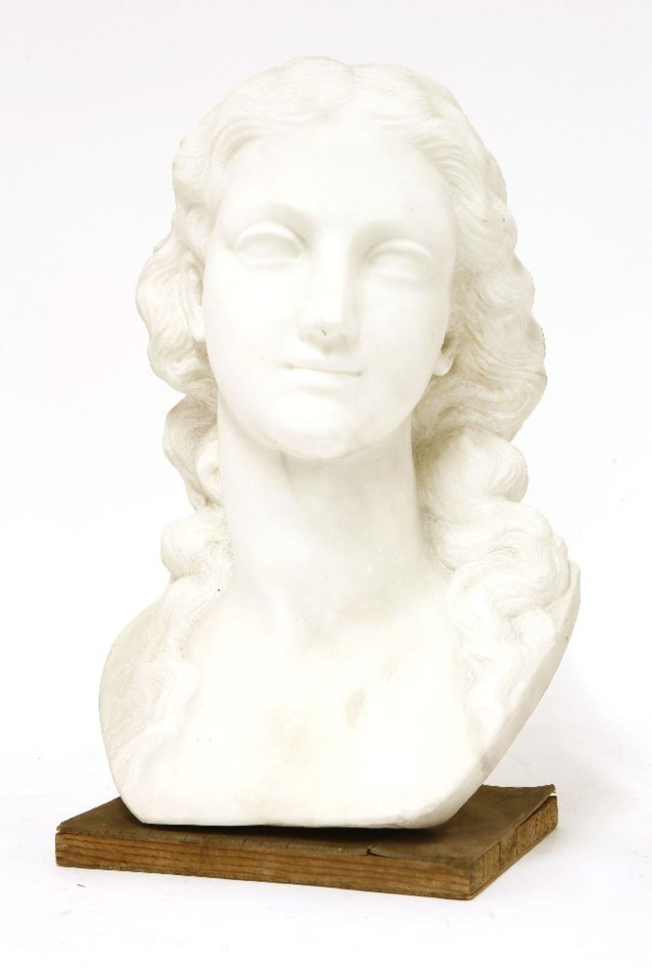 A marble bust,20th century, of a lady with flowing hair, on a plywood plinth,38cm high - Image 3 of 3