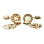 Four Staffordshire porcelain trios,early 19th century,Spode, decorated with stylised flowers and