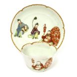 A rare Worcester tea bowl and saucer,c.1760, decorated in the 'Putai' pattern within indented and