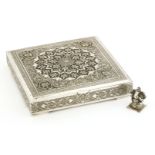 A Persian white metal box,Isfahan, mid-20th century, the hinged cover intricately worked with