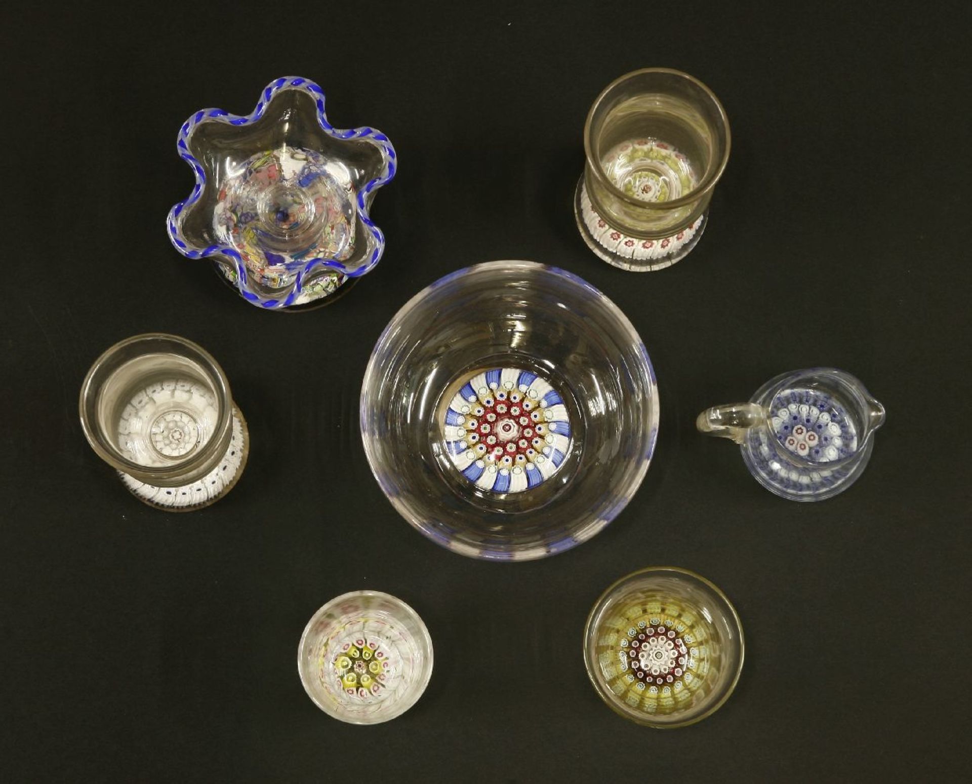 A collection of Stourbridge glass with millefiori paperweight bases,a pair of tall vases, 10cm,two