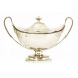 An oval two-handled silver tureen and cover, by Charles Stuart Harris, London 1901, 25cm high37cm